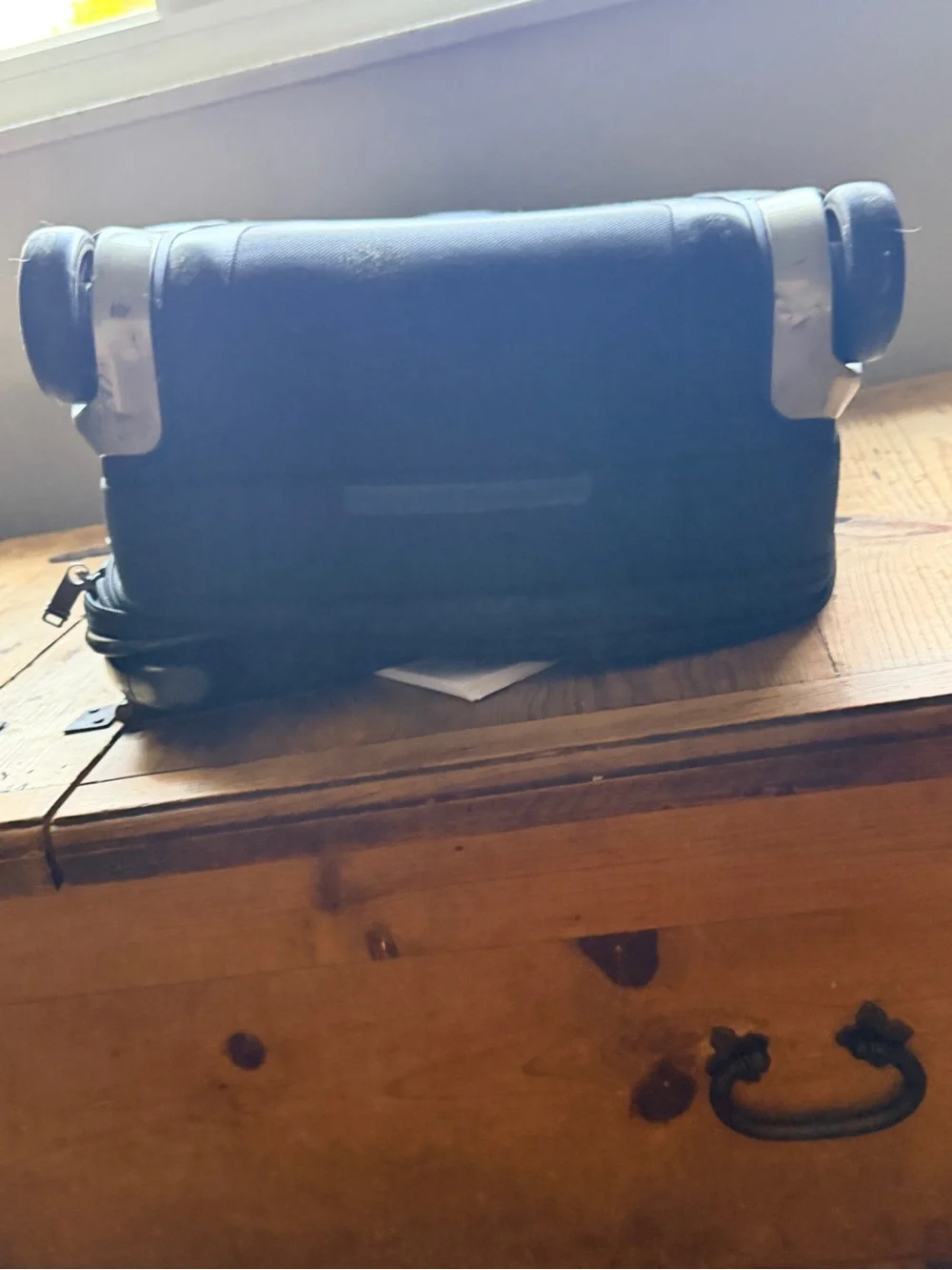 Tumi Black Rolling Suitcase with Front Pocket